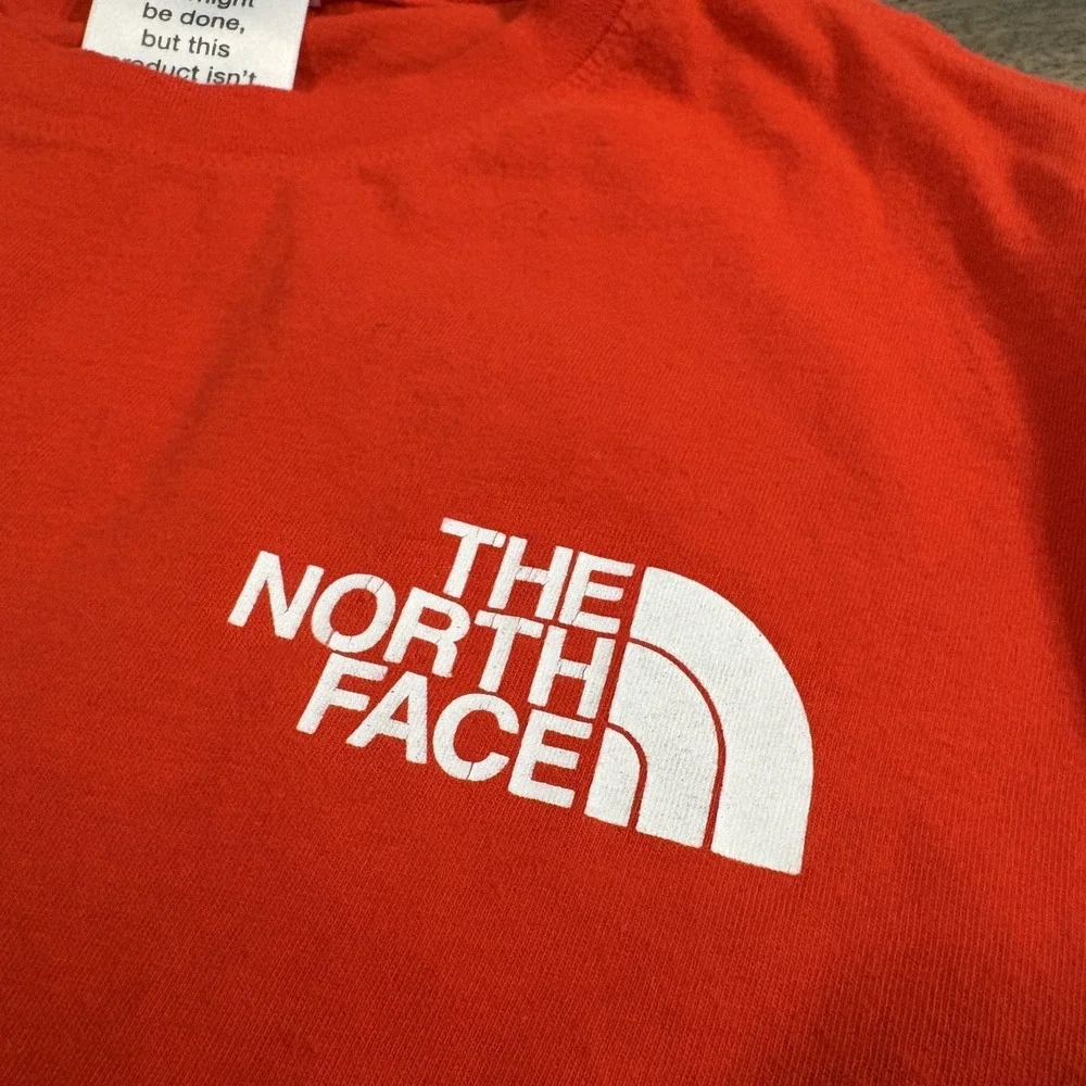 The North Face Shirt Mens Medium Orange Long Sleeve Graphic Circular Design